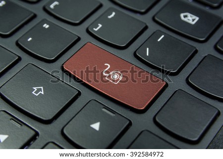 Close-up the Webcam symbol on the keyboard button and have Salmon color button isolate black keyboard