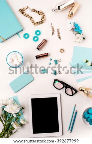 Still life of fashion woman,  blue objects on white