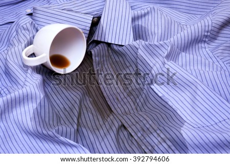 Close up photo of Coffee Spilled On A Shirt