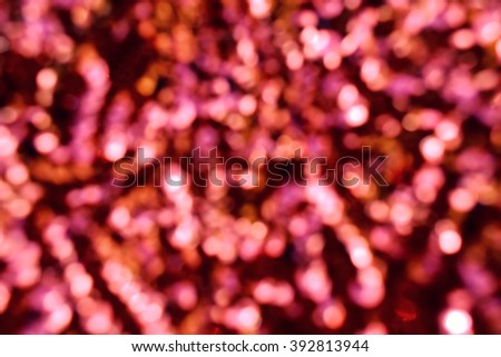 Bright and abstract blurred purple background with shimmering glitter