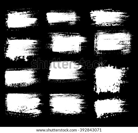 Grunge shapes, set, white isolated on black background, vector illustration. Royalty-Free Stock Photo #392843071