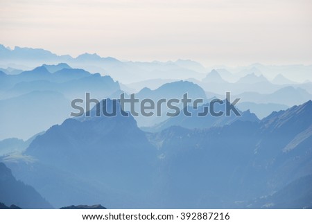 Mountain view in the mist Swiss alps
