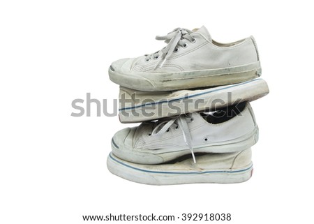The old shoe tower.dirty sneakers isolated on white. This has clipping path. copy space. 