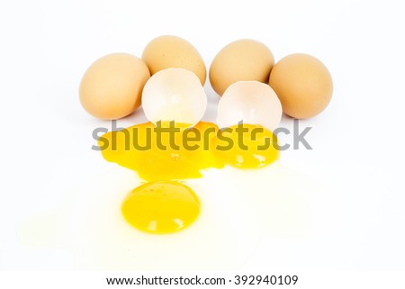 Egg in group broken on white background. This picture about food, breakfast or lunch and farm content. Selective focus at yolk.