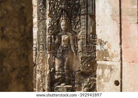Apsara dancer stone carving at Angkor Wat temple, Siem Reap, Cambodia