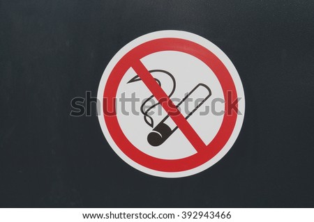 The sign no smoking allowed on a black background