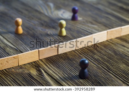 The concept of misunderstanding, a barrier in relations, denial of society. Barriers between people, prejudice. Royalty-Free Stock Photo #392958289