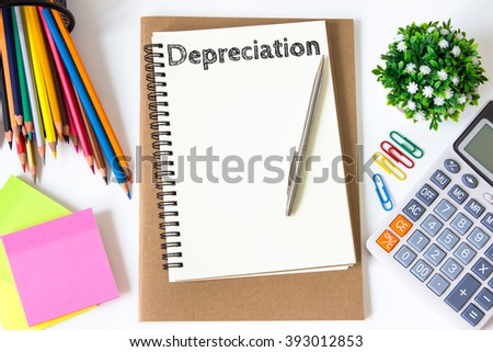 depreciation text message on white paper and office supplies, pen, paper note, on white desk , copy space / business concept / view from above, top view