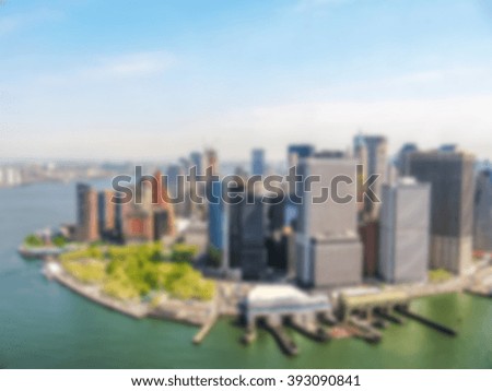 Defocused background with helicopter flight on Manhattan Skyline in New York City of America. Intentionally blurred post production for bokeh effect.