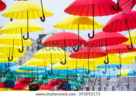 Ukraine. Kiev. Tour of the city of Kiev. Beautiful city. Day of the city. Colored umbrellas. Alley of colored umbrellas. Alley of umbrellas. Landmarks Royalty-Free Stock Photo #393092173