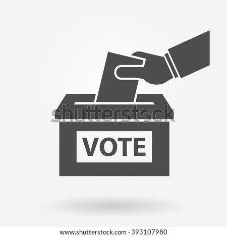 Voting concept. Hand putting paper in the ballot box  Royalty-Free Stock Photo #393107980