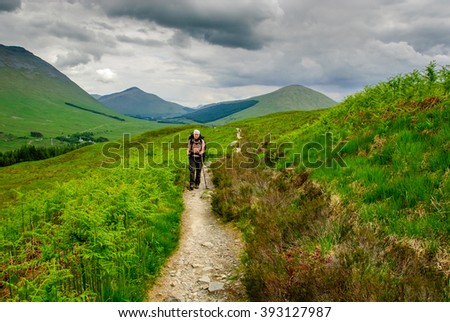Hiker West Highland Way scotland Royalty-Free Stock Photo #393127987