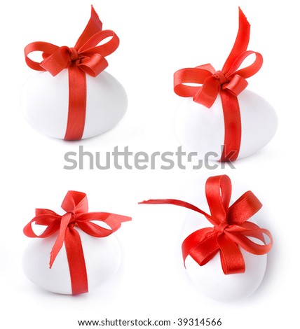 Collection set of White egg wrapped around with red ribbon isolate over white background