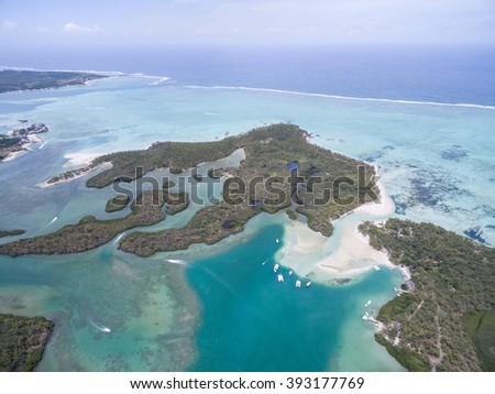 Ile aux Cerfs, Deer Island from above. Landscape with ocean and tree in background. Mauritius
