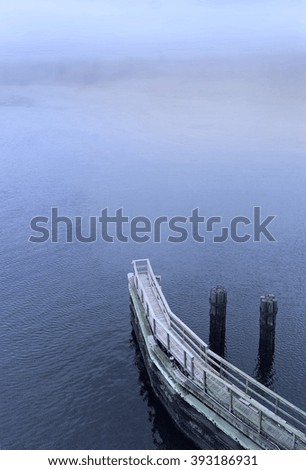 Wood pier in the fog.
