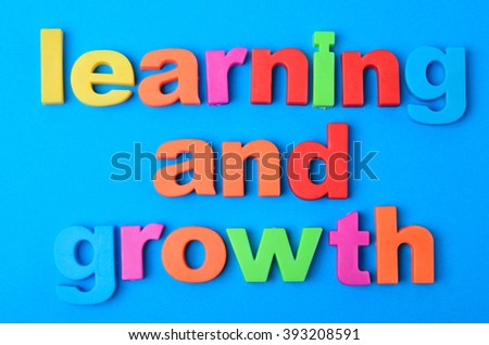 Words Learning and Growth on blue background