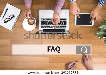 FAQ CONCEPT man touch bar search and Two Businessman working at office desk and using a digital touch screen tablet and use computer , top view