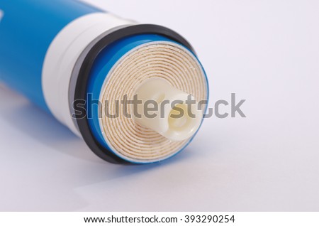 Reverse Osmosis Membrane on the white background. Selective focus. Royalty-Free Stock Photo #393290254
