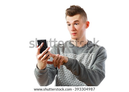 Caucasian man uses cellphone Studio portrait  Isolated on white.