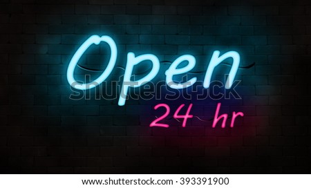 neon sign(open) on brick wall