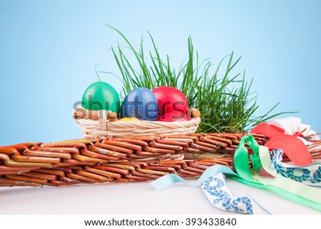 Easter colored eggs in a basket with Easter Caroling