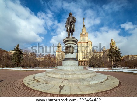 Wide angle sunny view of Mikhailo Lomonosov monument of Moscow State University as written on the bronze title 