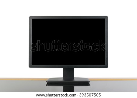 black monitor on desk office and reflect by black mirror on white background
