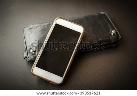 Soft focus - Cellphone and Wallet