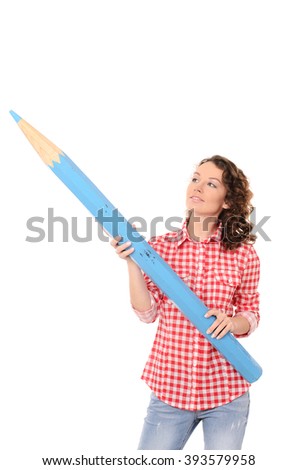 young pretty woman with wavy hair in checkered red shirt with big blue pencil isolated on white background