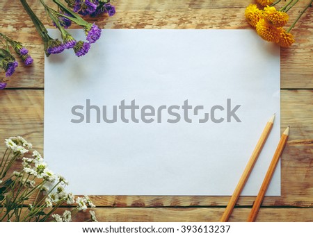 Mockup with spring flowers and blank paper. Vintage style