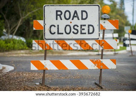 Road closed signs detour traffic temporary Royalty-Free Stock Photo #393672682