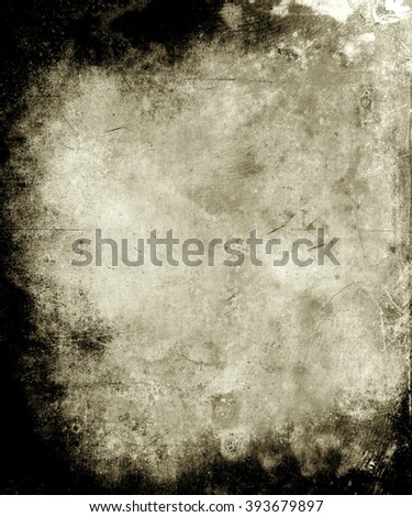 Abstract grunge texture background with faded central area for your text or picture