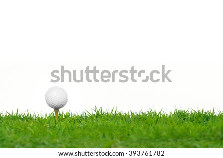 Golf ball on green grass isolated on white background