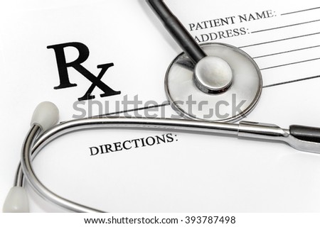 prescription form with stethoscope Royalty-Free Stock Photo #393787498