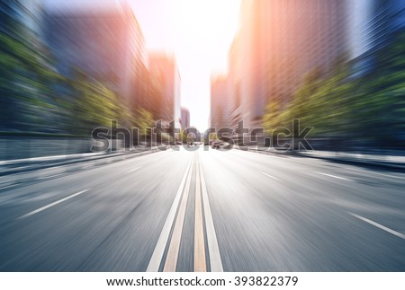city road through modern buildings in beijing Royalty-Free Stock Photo #393822379
