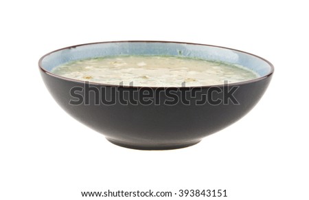 soup in a dish isolated on a white background