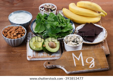Foods High in Magnesium on  wooden table. Healthy eating. Royalty-Free Stock Photo #393853477