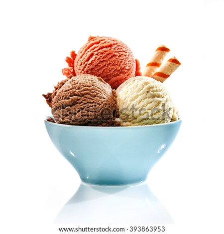 Trio of tasty chocolate vanilla and strawberry flavored frozen dessert in a blue bowl with two wafer straws Royalty-Free Stock Photo #393863953