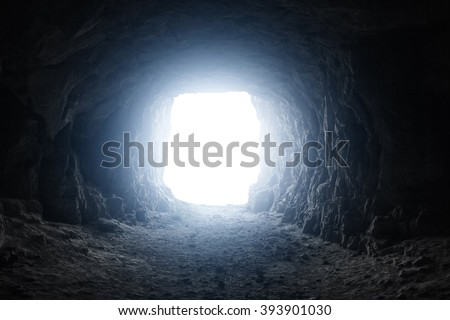 A light in the end of a tunnel Royalty-Free Stock Photo #393901030