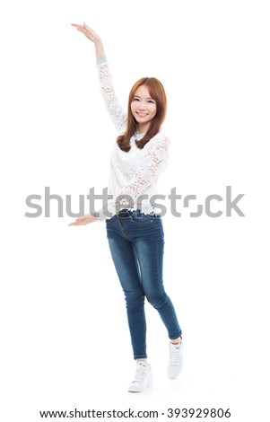 Asian woman present something isolated on white background. 
