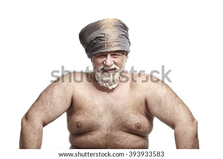 close-up portrait of an adult male in turbaned color beard and mustache on white background studio