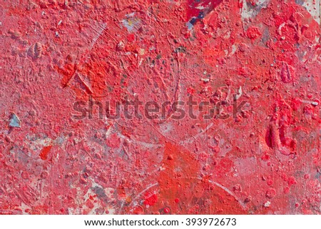Red tones Abstract colorful texture background. Splash acrylic color on wood door.