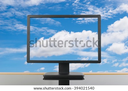 black monitor on desk office and reflect by black mirror on white background