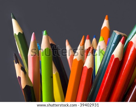 wooden pencils on black background