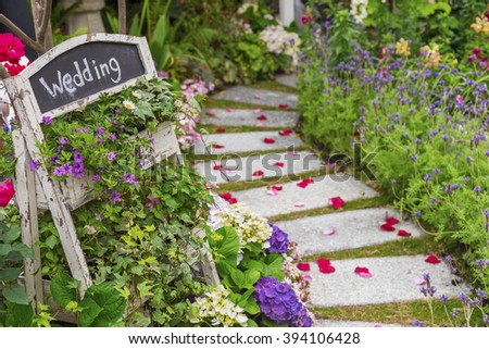 Romantic path to wedding banquet in beautiful green garden