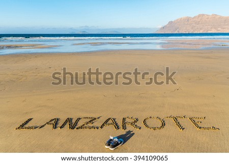 Text written on the beach, Lanzarote, Canary Islands, Spain