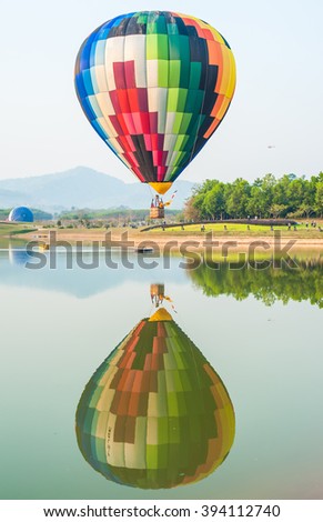 water reflection hot air balloon on the lagoons.