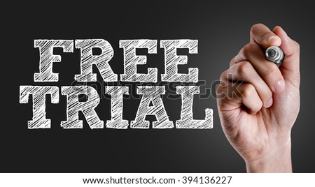 Hand writing the text: Free Trial