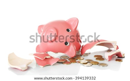 Broken piggy bank isolated on white background