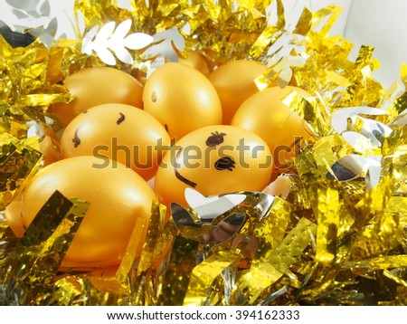 Group of easter eggs on golden tuft, happy easter day festival
